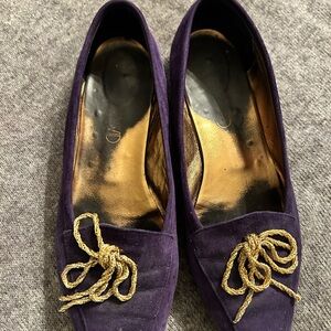Joan and David purple suede flats with gold bow ties